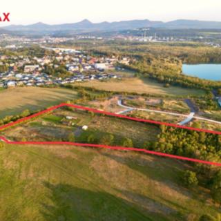 Prodej stavební parcely 23 011 m² Dubí Mstišov