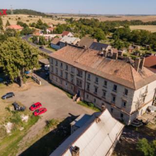 Prodej činžovního domu 1 065 m² Postoloprty Březno