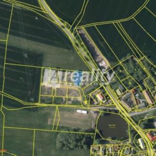 Prodej stavební parcely 718 m² Puklice