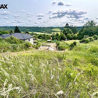 Prodej stavební parcely 1 497 m² Domoušice