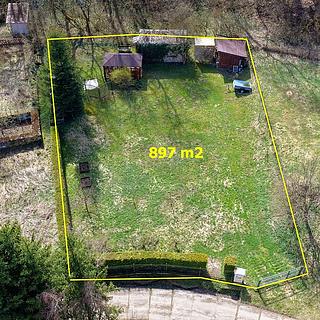 Prodej stavební parcely 897 m² Mšeno