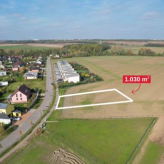 Prodej stavební parcely 1030 m² Horoušany