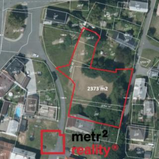 Prodej stavební parcely 2 373 m² Huzová