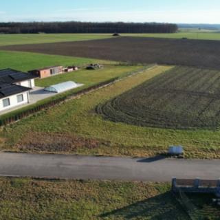 Prodej stavební parcely 2 702 m² Husí Lhota