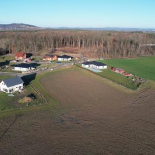 Prodej stavební parcely 2702 m² Husí Lhota