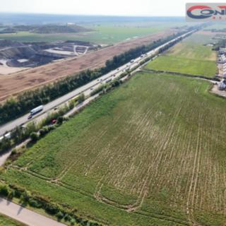 Prodej komerčního pozemku 9 021 m² Nehvizdy, Družstevní