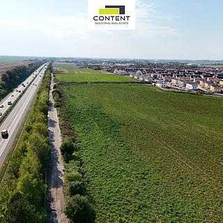 Prodej komerčního pozemku 9 021 m² Nehvizdy, Družstevní