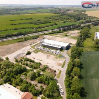 Prodej komerčního pozemku 11529 m² Mochov
