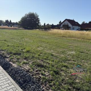 Prodej stavební parcely 927 m² Sány