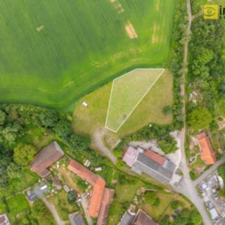 Prodej stavební parcely 986 m² Ledce