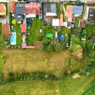 Prodej stavební parcely 2 625 m² Unhošť