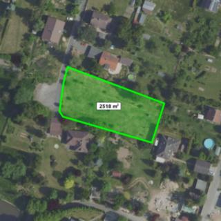 Prodej stavební parcely 2 518 m² Velké Popovice