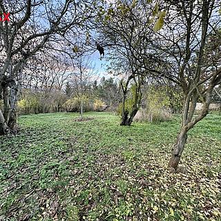 Prodej stavební parcely 1457 m² Unhošť