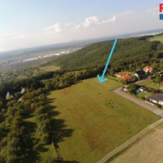 Prodej stavební parcely 1 850 m² Dobrovice Chloumek
