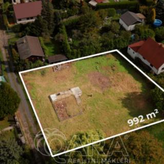 Prodej stavební parcely 992 m² Káraný
