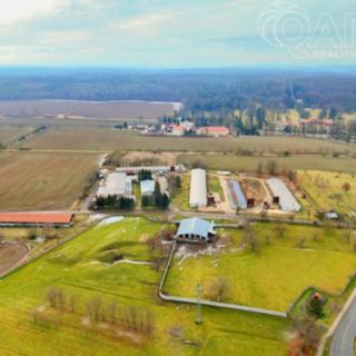 Prodej komerčního pozemku 23386 m² Lány