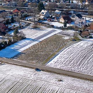 Prodej stavební parcely 2 594 m² Kunín