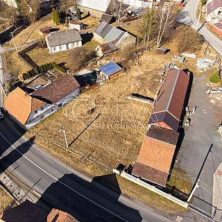 Prodej stavební parcely 1 568 m² Dvorce