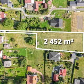 Prodej stavební parcely 2452 m² Pstruží