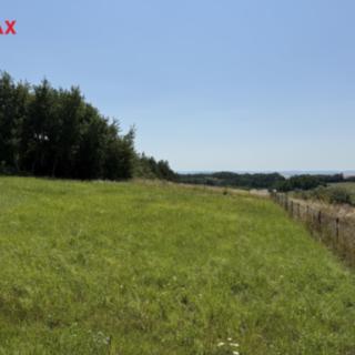 Prodej stavební parcely 2 168 m² Olšany