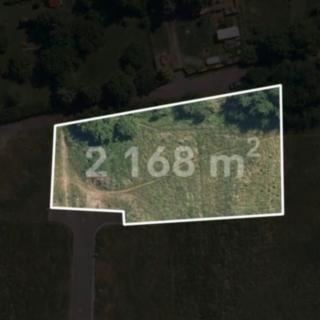 Prodej stavební parcely 2 168 m² Olšany