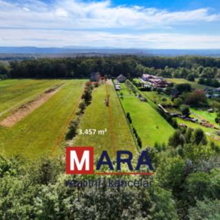 Prodej stavební parcely 3 457 m² Dolní Újezd