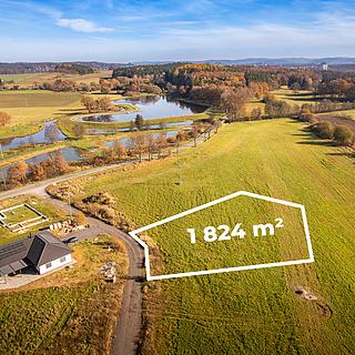 Prodej stavební parcely 1 824 m² Hajany