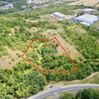 Prodej komerčního pozemku 9139 m² Most