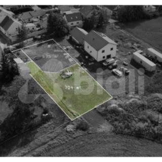 Prodej stavební parcely 704 m² Pchery