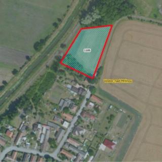 Prodej stavební parcely 5 392 m² Vestec