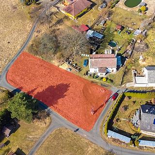 Prodej stavební parcely 1 163 m² Pila