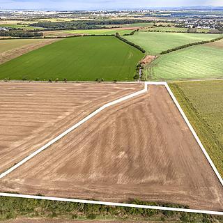 Prodej stavební parcely 28 407 m² Praha Královice