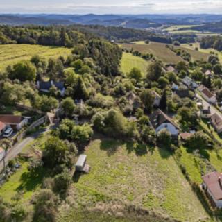 Prodej stavební parcely 1 092 m² Drevníky