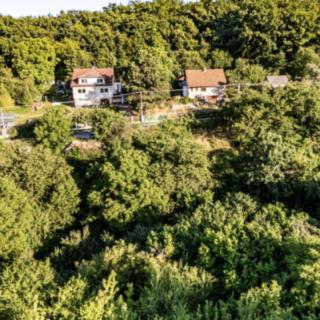 Prodej stavební parcely 1 306 m² Horoměřice