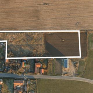 Prodej stavební parcely 8247 m² Hostín u Vojkovic