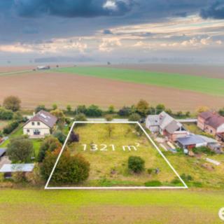 Prodej stavební parcely 1321 m² Mžany
