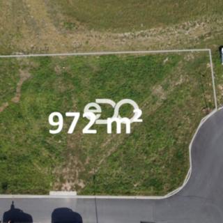 Prodej stavební parcely 972 m² Charvatce