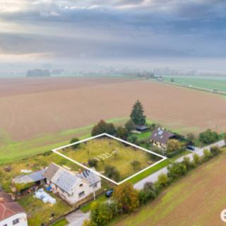 Prodej stavební parcely 1 321 m² Mžany