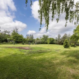Prodej stavební parcely 1807 m² Mezouň