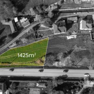 Prodej stavební parcely 1425 m² Bušín