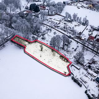 Prodej stavební parcely 3 300 m² Dolní Nivy