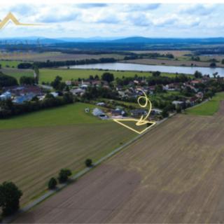 Prodej stavební parcely 1399 m² Tálín