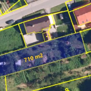 Prodej stavební parcely 710 m² Komořany