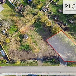 Prodej stavební parcely 615 m² Úherce