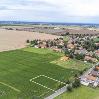 Prodej stavební parcely 1000 m² Břežany I