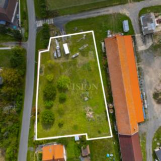 Prodej stavební parcely 2 579 m² Ouběnice